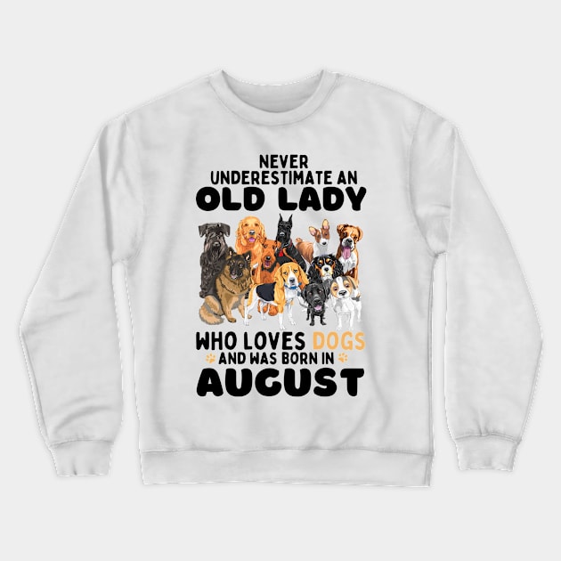 Never Underestimate An Old Lady Who Loves Dogs And Was Born In August Crewneck Sweatshirt by JustBeSatisfied